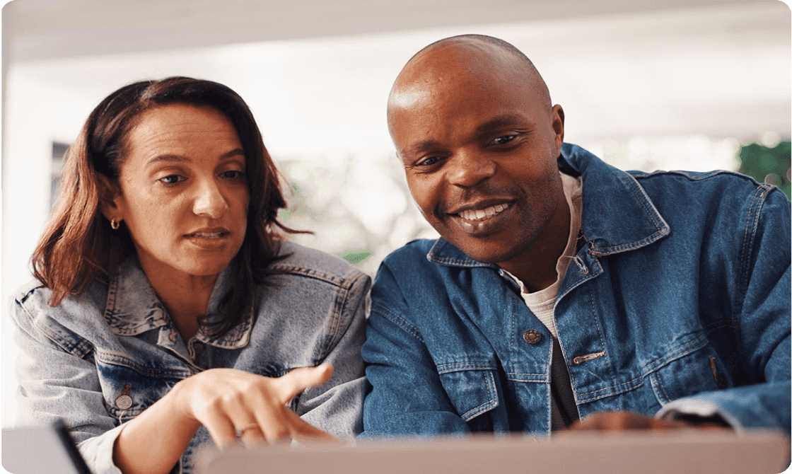 Couple looking at EQ Bank FAQs